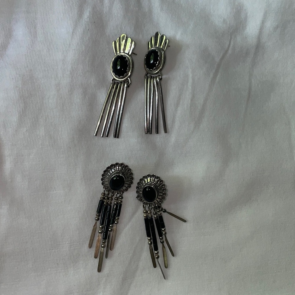 TWO a pair of 925 sterling silver earrings